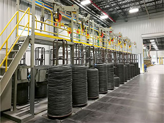 Размотчик с вертикальным шпинделем